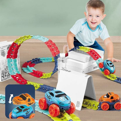 petit garçon qui joue avec un circuit voiture circuit voiture enfant cadeau de noel 
